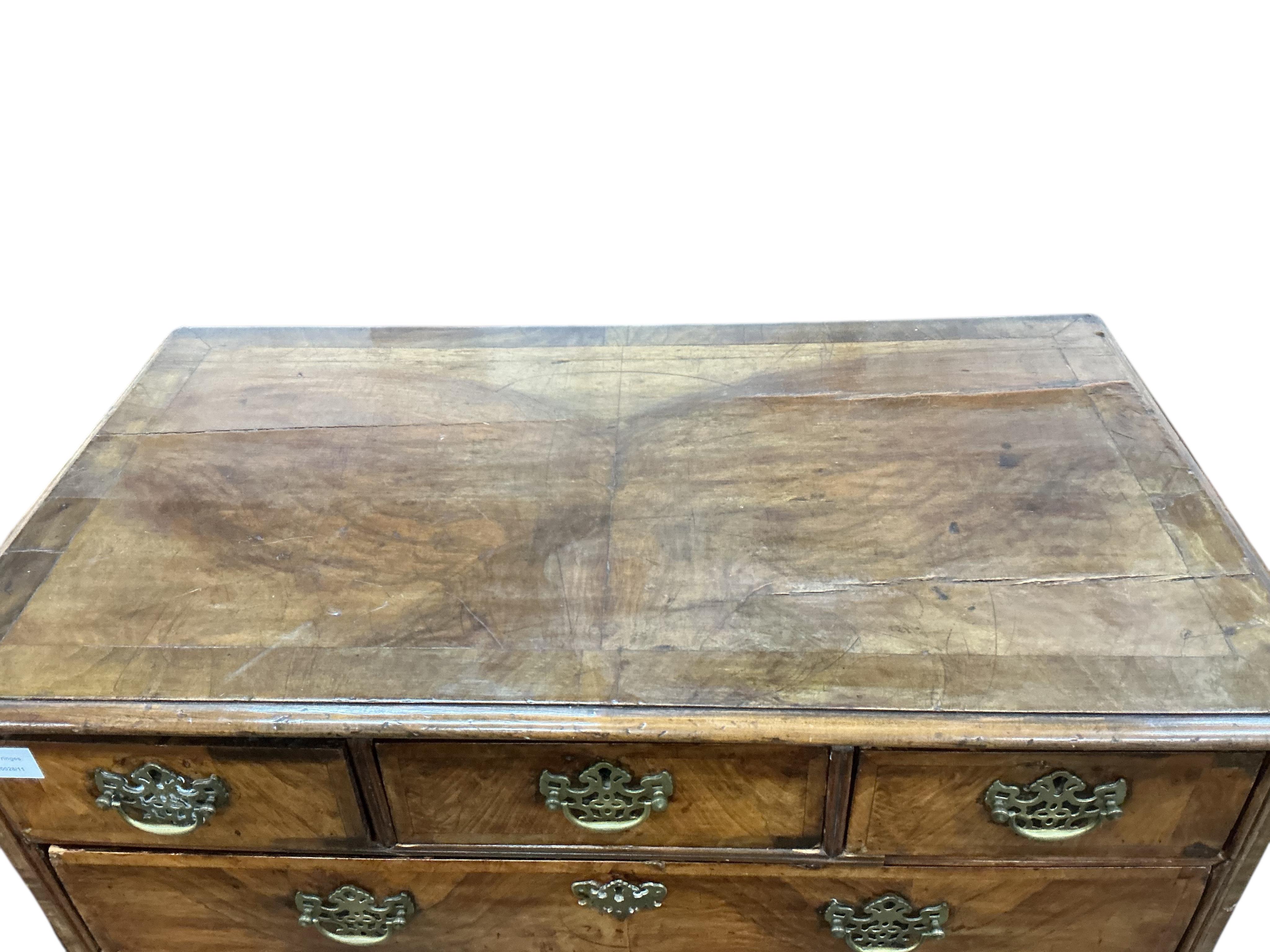 An 18th century banded walnut chest on stand, width 99cm, depth 54cm, height 128cm